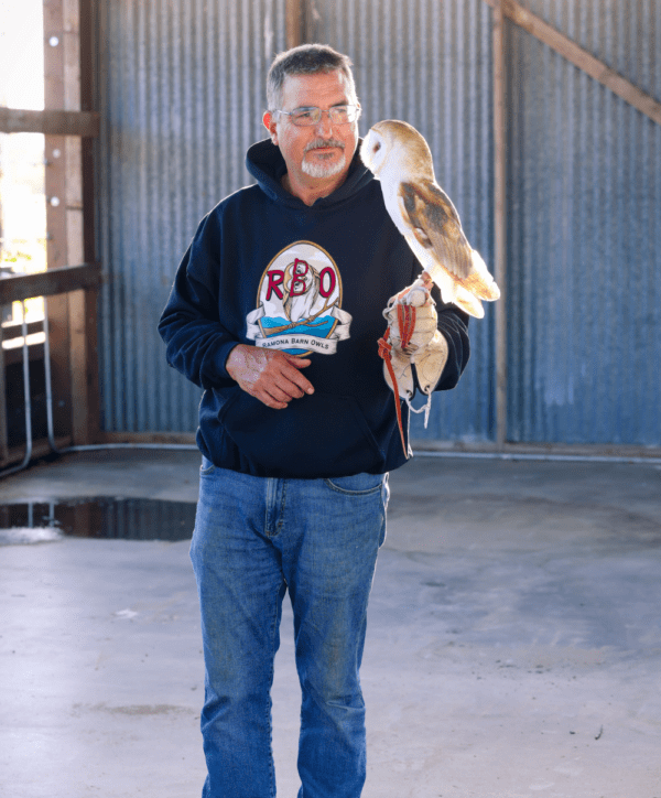 Man Wearing Ramona Barn Owl Hoodie in Black