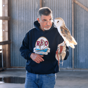 Man Wearing Ramona Barn Owl Hoodie in Black