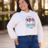 Woman Wearing Cropped Hoodie with Red Owl Logo in Heather Dust