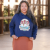 Woman Wearing Cropped Hoodie with Red Owl Logo in Navy