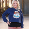 Woman Wearing Cropped Hoodie with Red Owl Logo in Navy