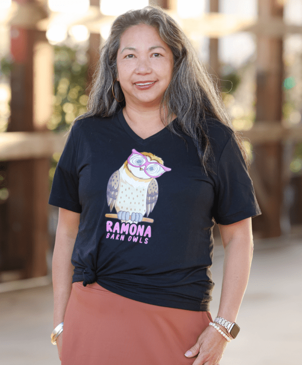 Woman Wearing Ramona Barn Owl V Neck Tea in Black