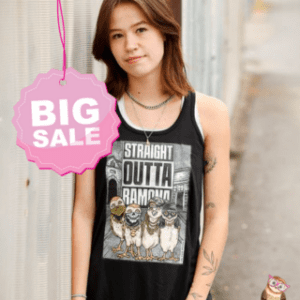 Teen wearing black flowy racerback tank with owl graphic.