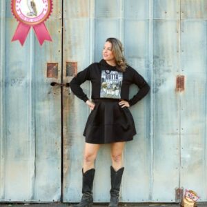 Woman wearing black cropped hoodie with Straight Outta San Diego design.